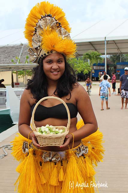 girl with Tiare flowers, Bora Bora, French Polynesia, copyright Angela Fairbank