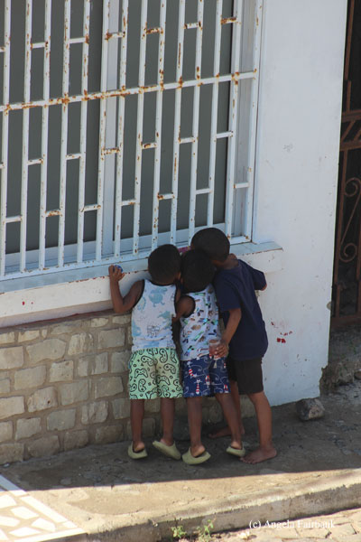 children looking in window