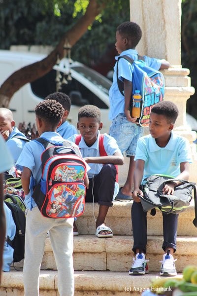 boys waiting for school bus